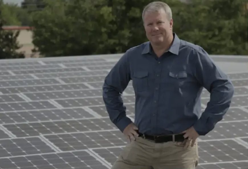 Robert McLaughlin on a rooftop solar array installed through Goodwill's Solar for Good program
